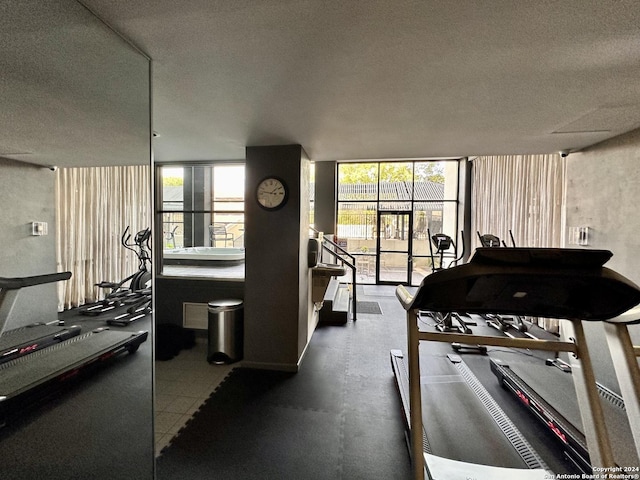 gym with a textured ceiling