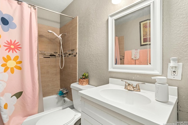 full bathroom with vanity, toilet, and shower / tub combo with curtain