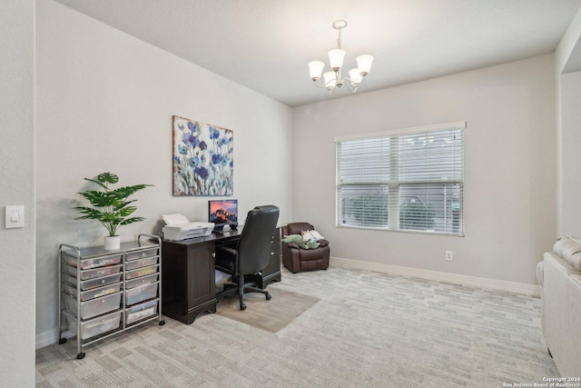 carpeted home office with a notable chandelier