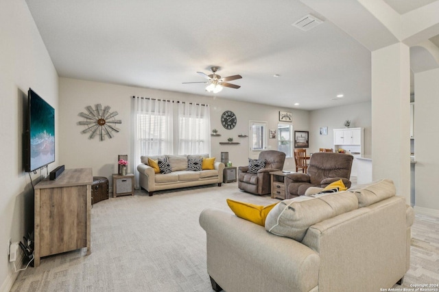 living room with ceiling fan