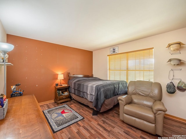 bedroom featuring hardwood / wood-style floors