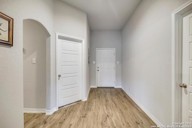 hall with light wood-type flooring