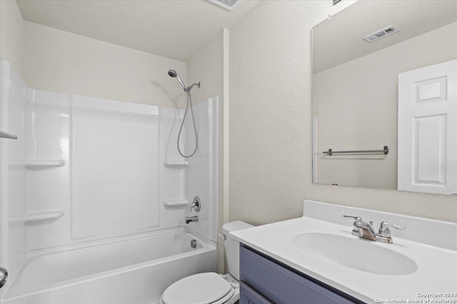 full bathroom with a textured ceiling, vanity, toilet, and shower / bathtub combination