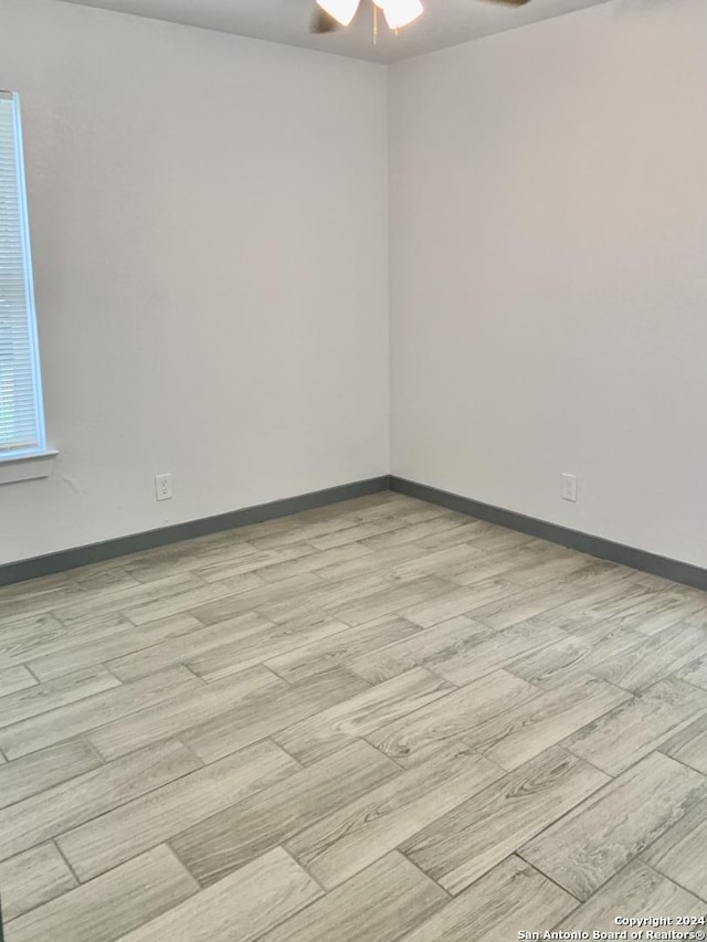 empty room featuring ceiling fan