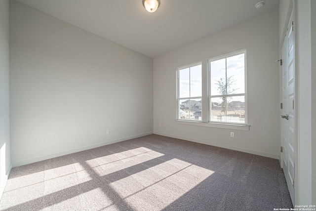 10286 Bartenheim Dr, Schertz, TX 78154 - carpeted empty room featuring baseboards, a smoke detector, and lofted ceiling