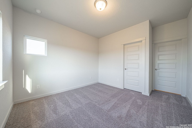 10286 Bartenheim Dr, Schertz, TX 78154 - unfurnished bedroom with carpet floors and baseboards