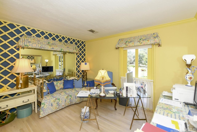 living room with wood-type flooring and ornamental molding