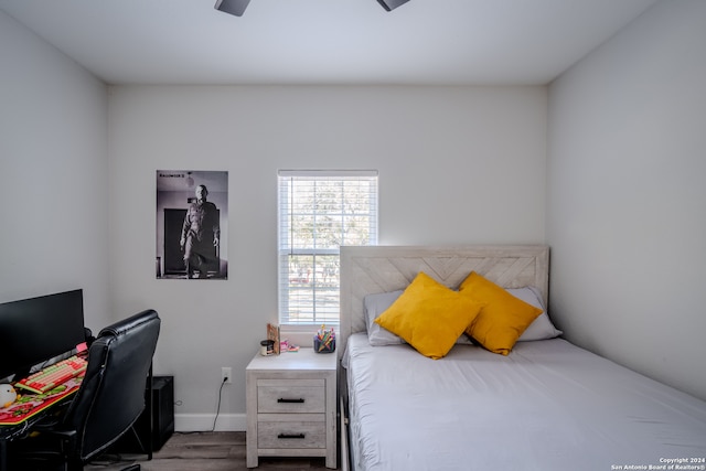 bedroom featuring wood-type flooring