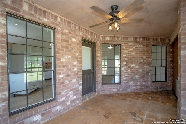 interior space featuring ceiling fan