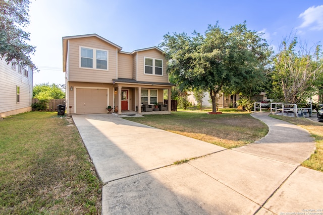 view of front facade with a garage and a front yard