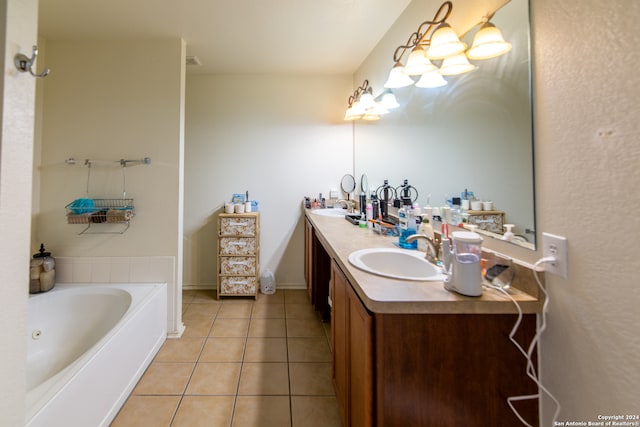 bathroom featuring a bath, tile flooring, oversized vanity, and double sink