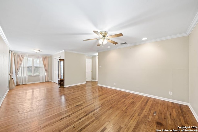 unfurnished room featuring crown molding, ceiling fan, and light hardwood / wood-style floors