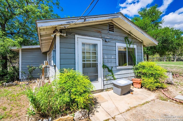 view of home's exterior with a patio