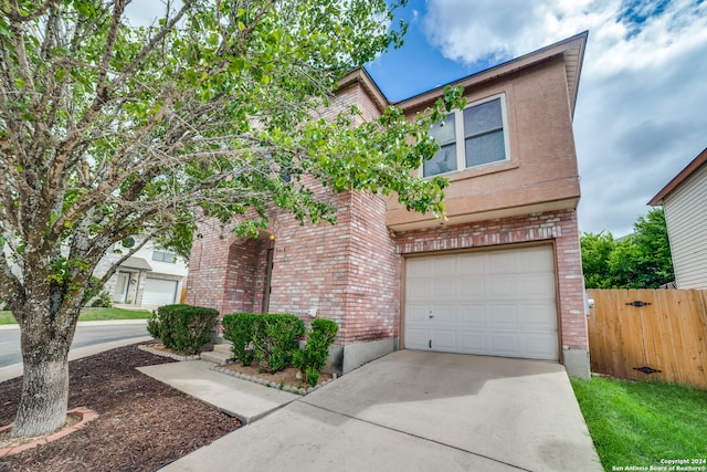 view of front of home with a garage