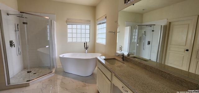 bathroom with vanity, plus walk in shower, and tile patterned flooring