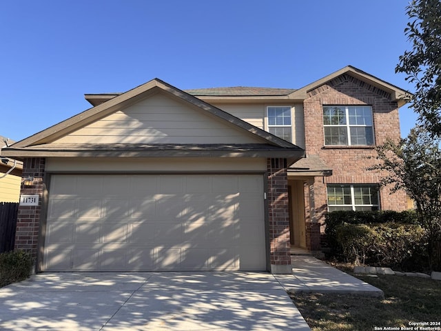 view of front of home with a garage