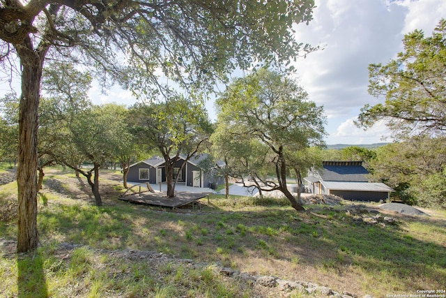 view of yard featuring a deck