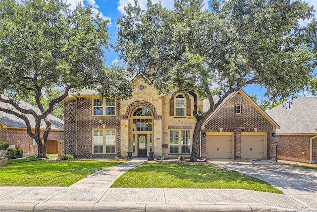 view of front of house featuring french doors and a front lawn