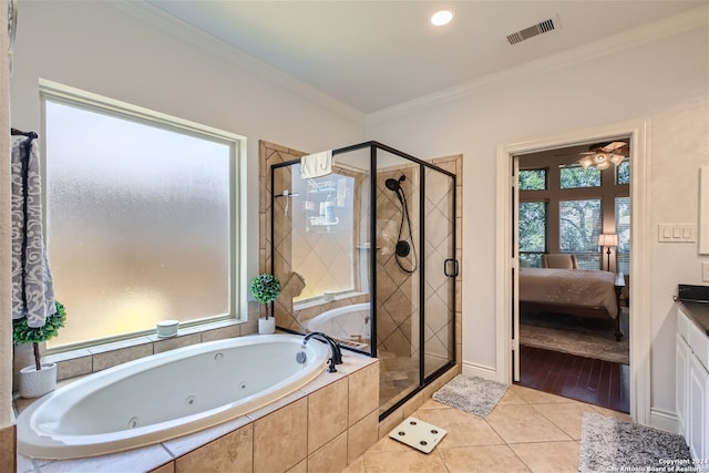 bathroom with ornamental molding, independent shower and bath, hardwood / wood-style flooring, and ceiling fan