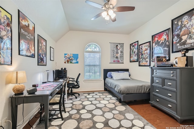 office space with vaulted ceiling, hardwood / wood-style floors, and ceiling fan