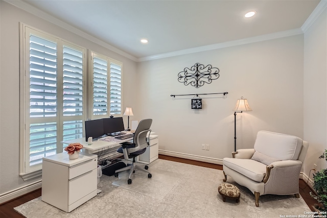 office area featuring ornamental molding, a wealth of natural light, and hardwood / wood-style flooring