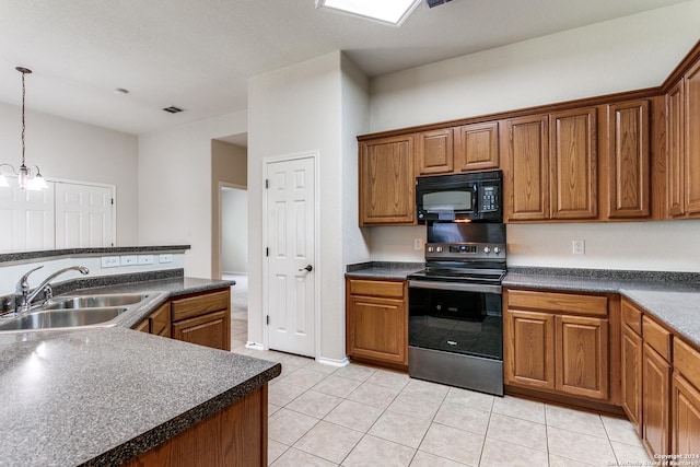 kitchen featuring stainless steel range with electric stovetop, sink, light tile patterned floors, decorative light fixtures, and a chandelier