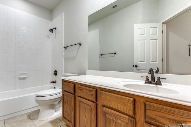 full bathroom featuring tile patterned floors, vanity, toilet, and tub / shower combination