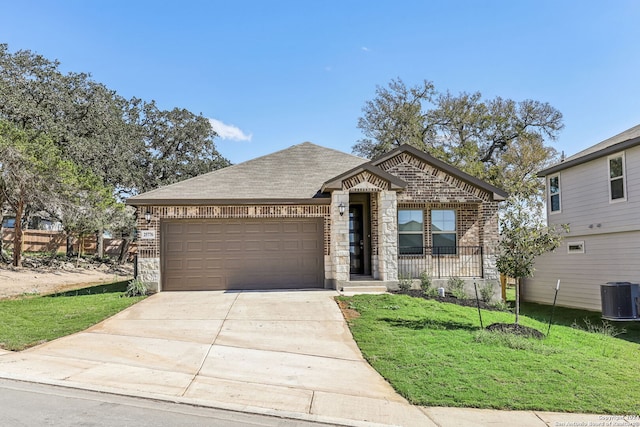 25776 Rosey Way, Boerne, TX 78006 - view of front of property with central air condition unit, an attached garage, a front yard, brick siding, and concrete driveway