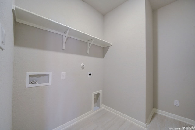 clothes washing area featuring washer hookup, gas dryer hookup, and hookup for an electric dryer