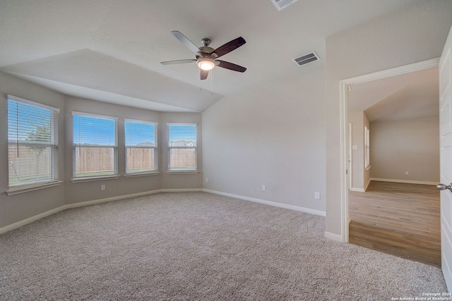 25776 Rosey Way, Boerne, TX 78006 - carpeted empty room featuring a ceiling fan, healthy amount of natural light, lofted ceiling, and baseboards