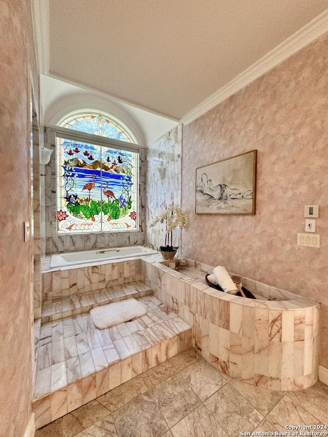 bathroom featuring crown molding and tiled bath