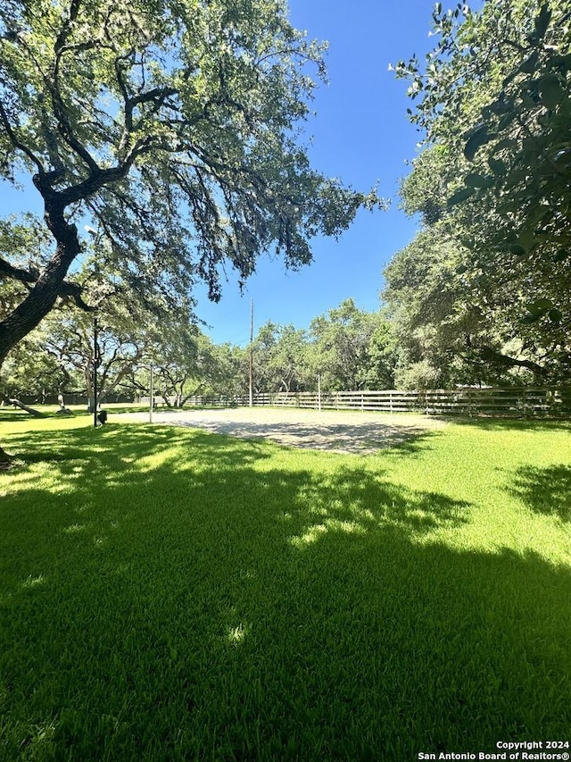 view of community with a lawn