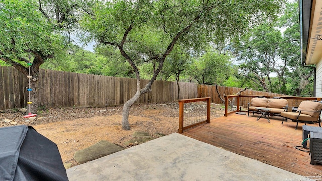 exterior space featuring outdoor lounge area and a deck