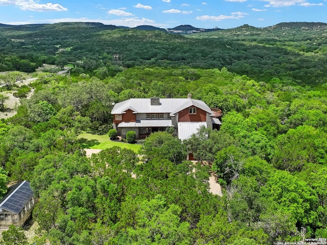 drone / aerial view featuring a mountain view