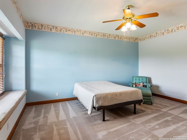 bedroom featuring carpet and ceiling fan