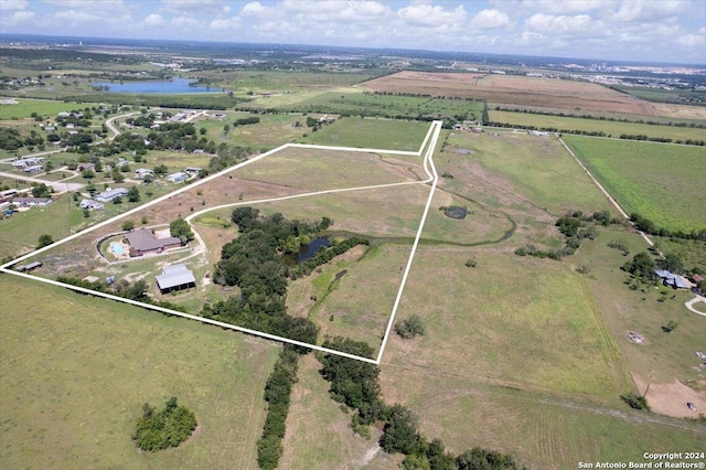 bird's eye view featuring a rural view and a water view