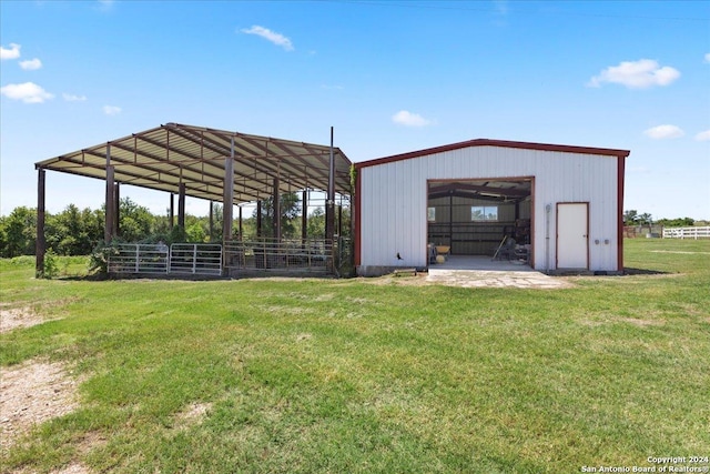 view of outdoor structure with a yard