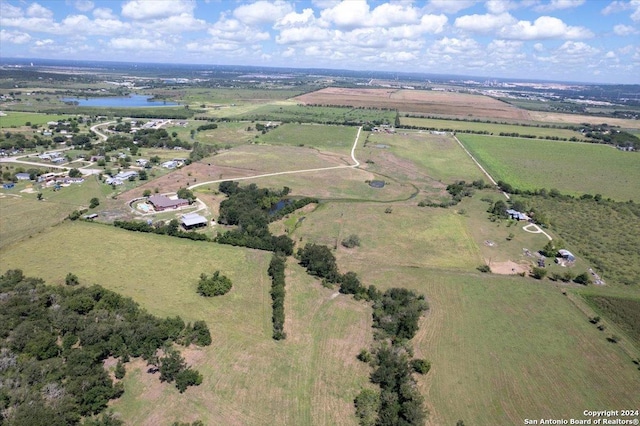 bird's eye view featuring a water view and a rural view