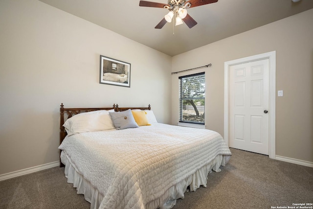 carpeted bedroom featuring ceiling fan