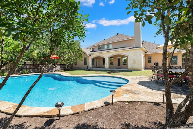 view of pool with a patio area