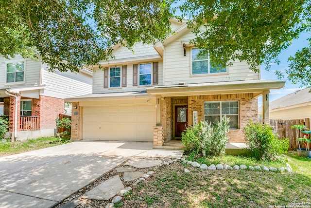 view of front of home with a garage and covered porch