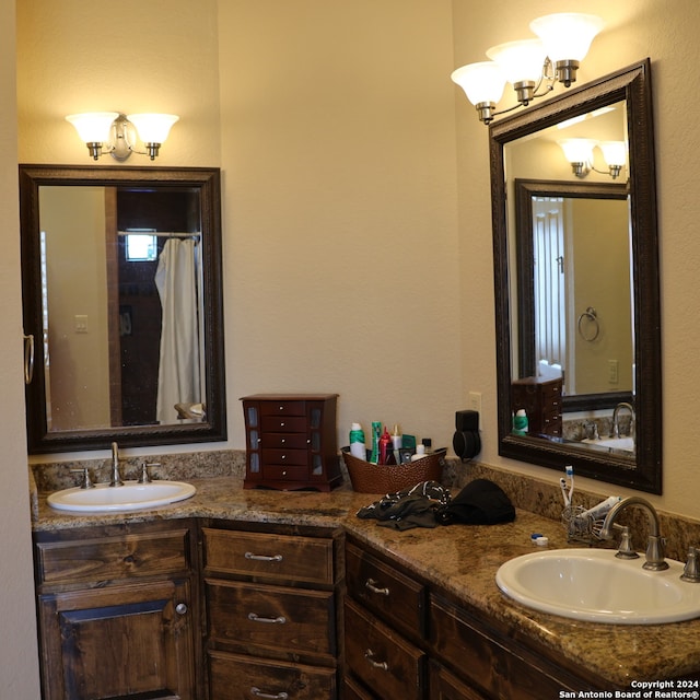 bathroom featuring double vanity