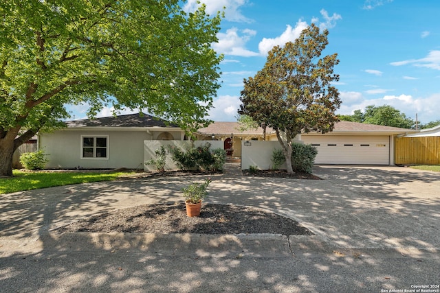 ranch-style home with a garage