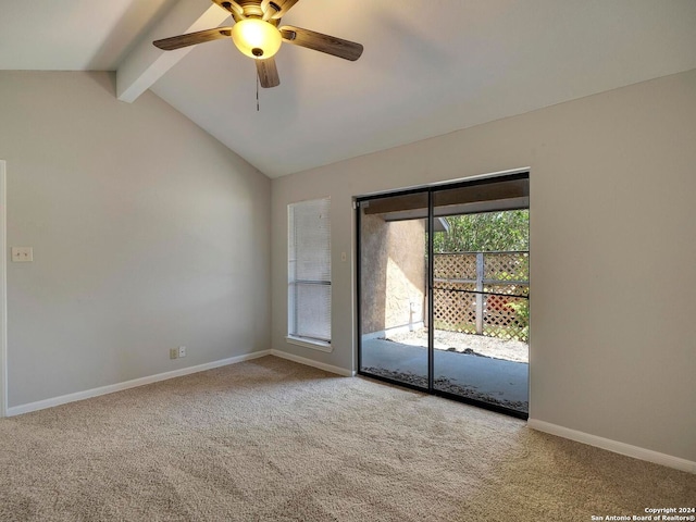 carpeted empty room featuring lofted ceiling with beams and ceiling fan