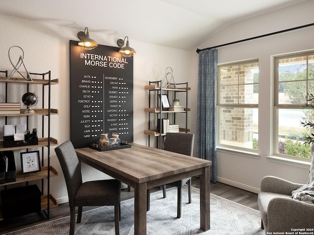 office with hardwood / wood-style flooring and vaulted ceiling