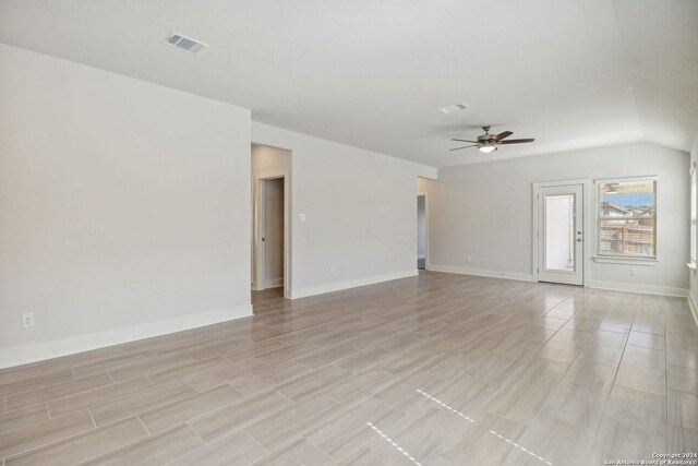 carpeted bedroom featuring lofted ceiling