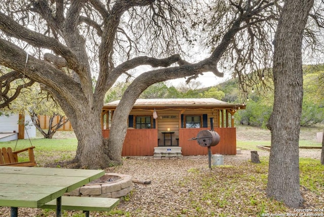 exterior space with metal roof