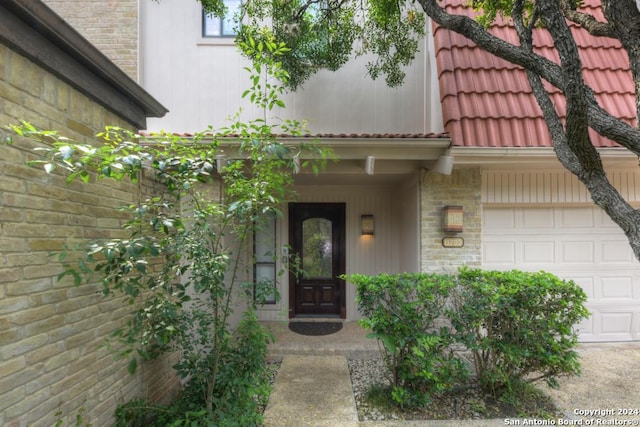 property entrance featuring a garage