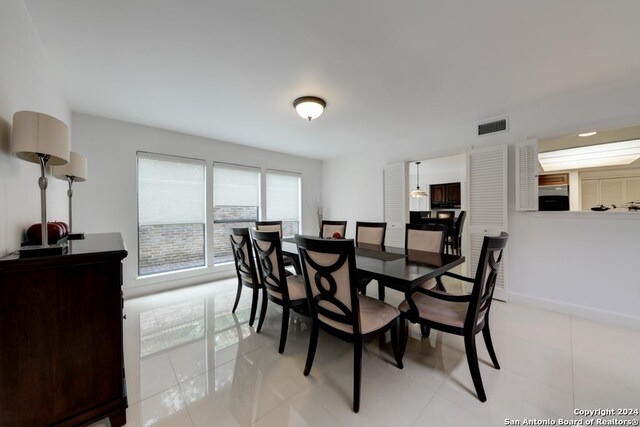 view of tiled dining room