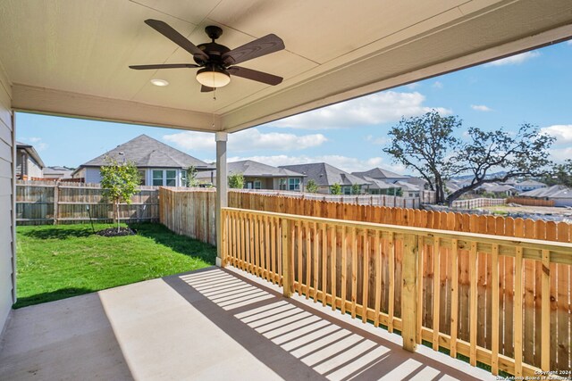 view of patio with ceiling fan